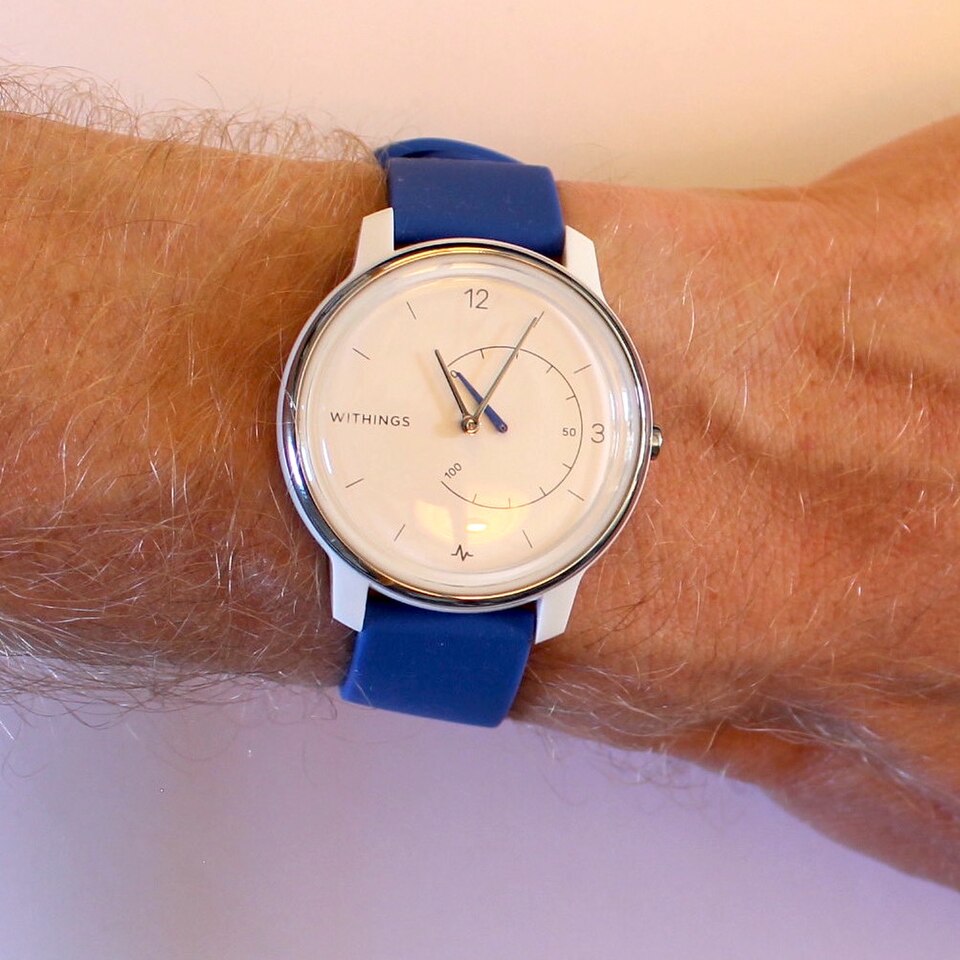 A health-tracking smartwatch worn on a wrist